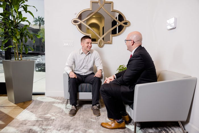 Attorney Joshua Ernst meeting with a client